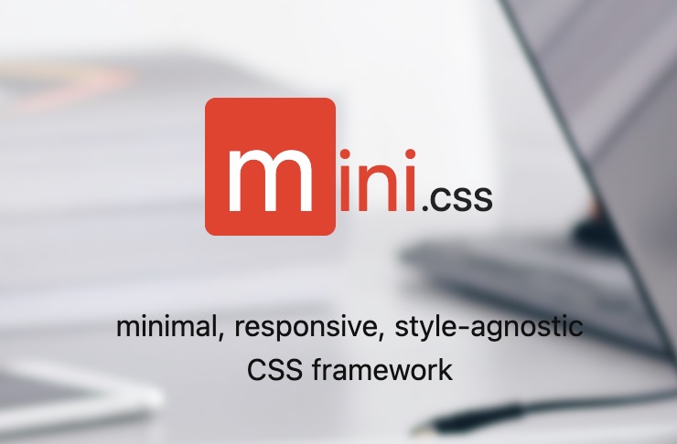 The mini.css logo with the words minimal, responsive, style-agnostic CSS framework overlaid on a graphic of a desk and laptop
